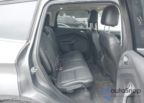 2014 Ford Escape Titanium z USA, uszkodzony, nr VIN 1FMCU0J94EUD63458